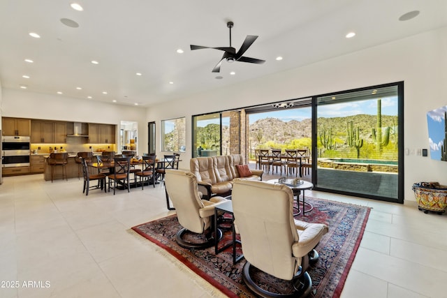 dining room with recessed lighting, ceiling fan, and light tile patterned floors