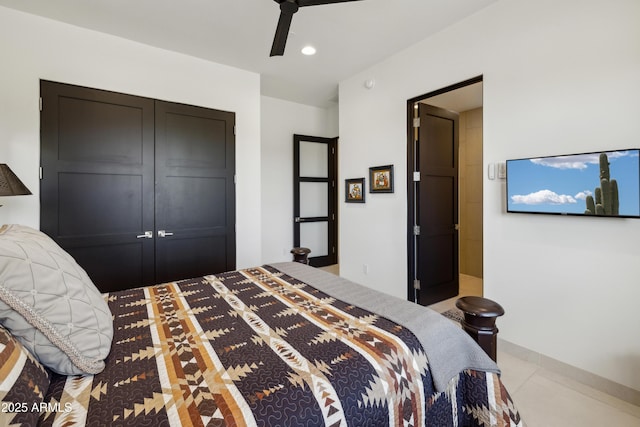 bedroom featuring a ceiling fan, recessed lighting, light tile patterned floors, and a closet