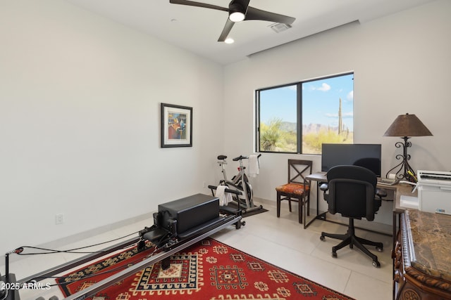 office area with ceiling fan, visible vents, and light tile patterned floors