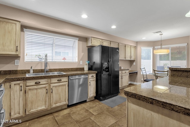 kitchen with tile counters, black fridge with ice dispenser, stainless steel dishwasher, light brown cabinets, and a sink