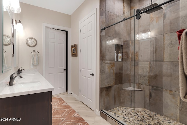 bathroom featuring vanity, wood-type flooring, and walk in shower