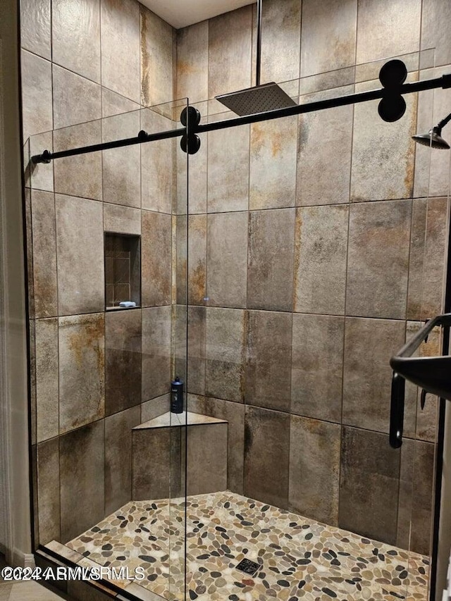 bathroom featuring walk in shower