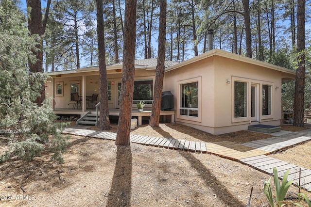 view of front of home with a wooden deck