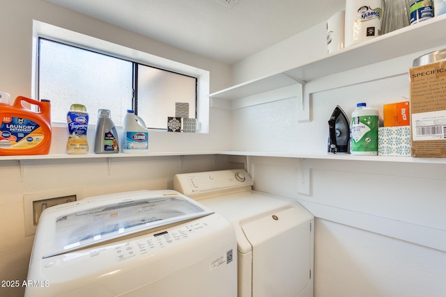 laundry area with washer and dryer and laundry area