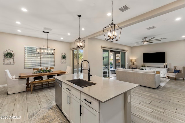 kitchen featuring visible vents, a sink, dishwasher, and recessed lighting