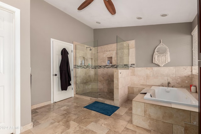 bathroom featuring separate shower and tub and ceiling fan