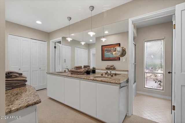6516 E Maverick Rd, Paradise Valley, AZ 85253 - full bathroom with double vanity, a sink, baseboards, and recessed lighting