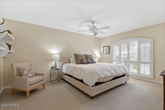 6516 E Maverick Rd, Paradise Valley, AZ 85253 - bedroom with baseboards, access to exterior, light colored carpet, and ceiling fan