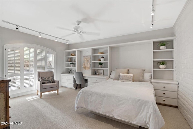 6516 E Maverick Rd, Paradise Valley, AZ 85253 - bedroom featuring light colored carpet, rail lighting, and a ceiling fan