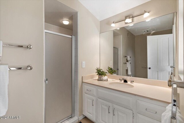 6516 E Maverick Rd, Paradise Valley, AZ 85253 - bathroom with vanity and a shower stall