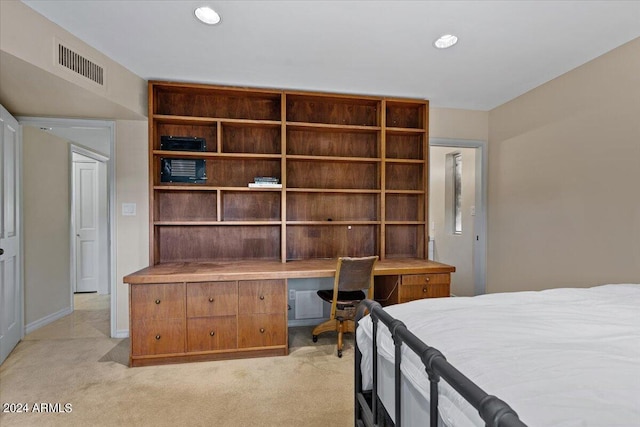 6516 E Maverick Rd, Paradise Valley, AZ 85253 - bedroom featuring baseboards, built in desk, visible vents, and light colored carpet