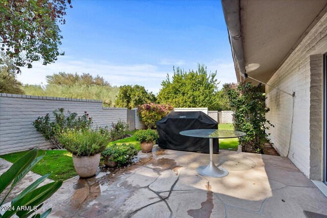 6516 E Maverick Rd, Paradise Valley, AZ 85253 - view of patio / terrace with a fenced backyard and grilling area