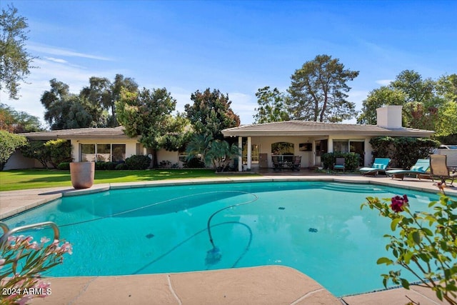 6516 E Maverick Rd, Paradise Valley, AZ 85253 - pool with a patio and a lawn