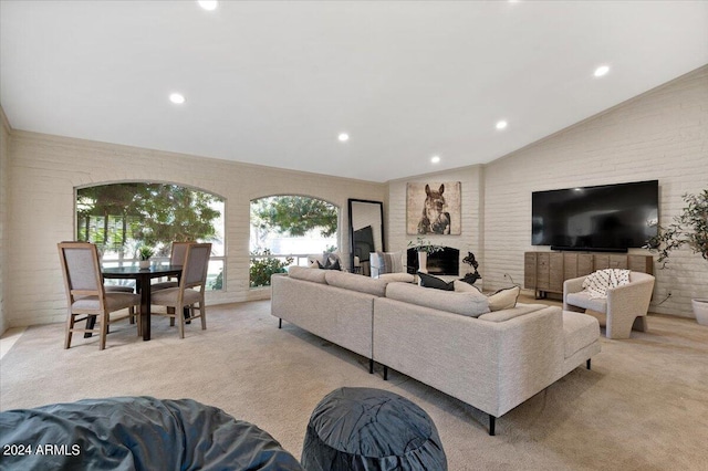 6516 E Maverick Rd, Paradise Valley, AZ 85253 - living room featuring lofted ceiling, a healthy amount of sunlight, recessed lighting, and carpet floors