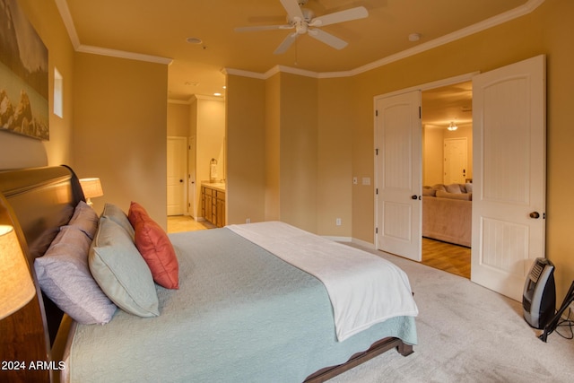 bedroom featuring ornamental molding, connected bathroom, baseboards, and ceiling fan