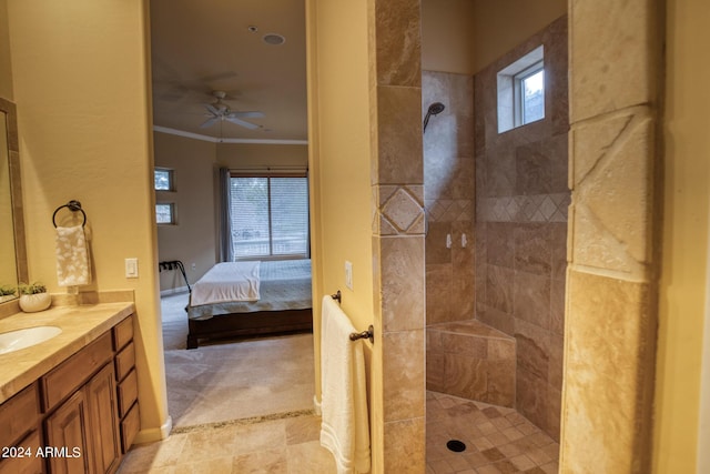 ensuite bathroom featuring ensuite bath, ornamental molding, vanity, a healthy amount of sunlight, and a walk in shower