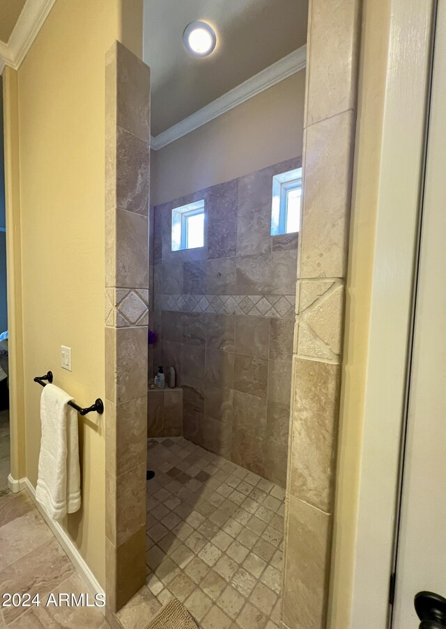 full bathroom with crown molding and walk in shower