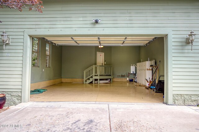 laundry area with washer / clothes dryer, laundry area, a sink, and baseboards