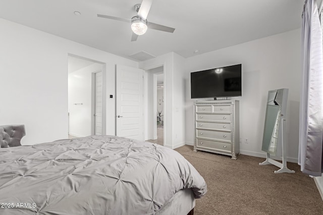 carpeted bedroom featuring baseboards and a ceiling fan