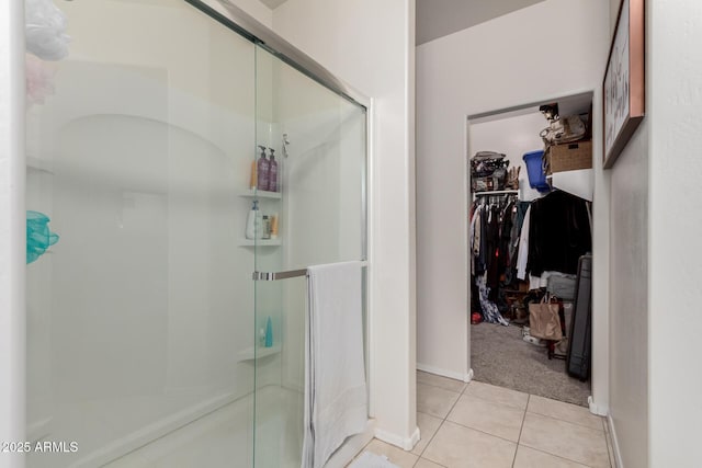 bathroom featuring tile patterned floors and walk in shower