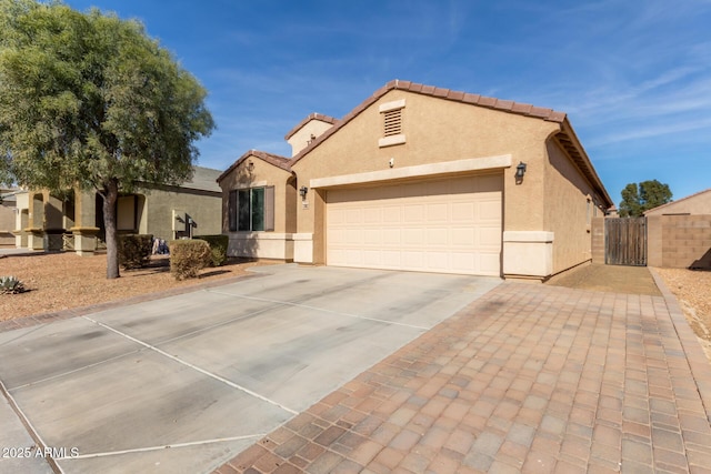 view of front of home with a garage