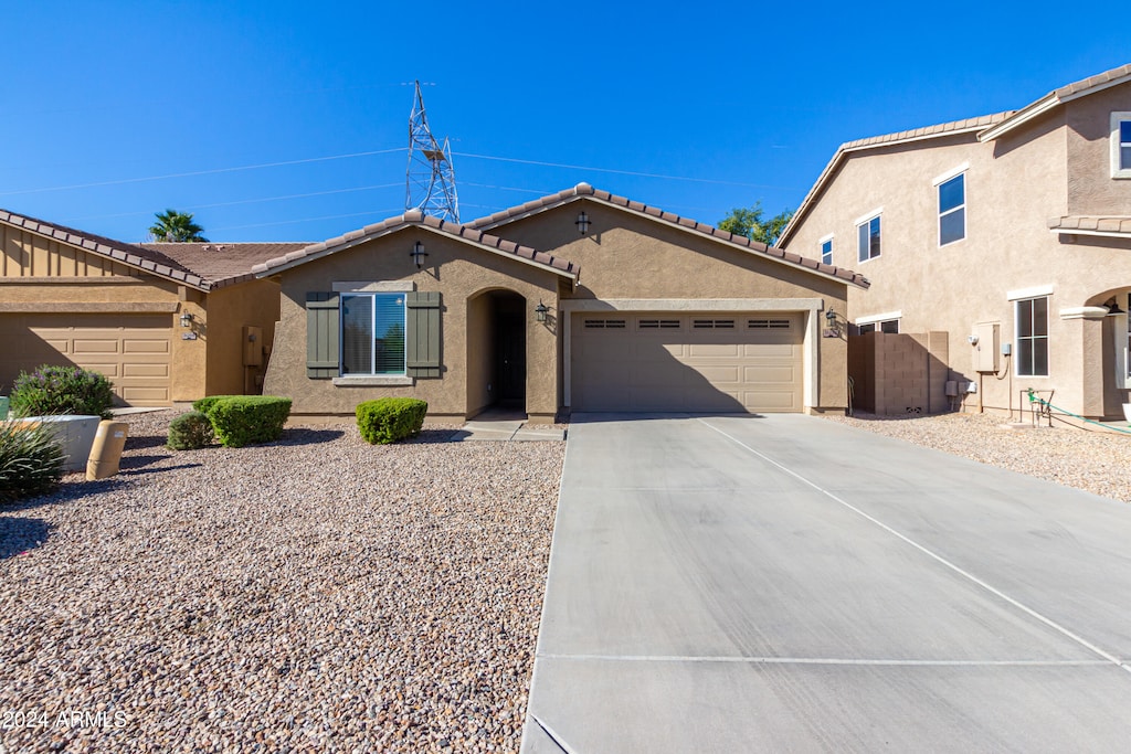 view of front of home featuring a garage