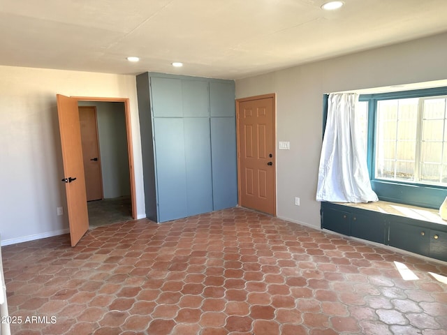 1705 E 6th St, Douglas, AZ 85607 - foyer entrance featuring recessed lighting, stone finish flooring, and baseboards