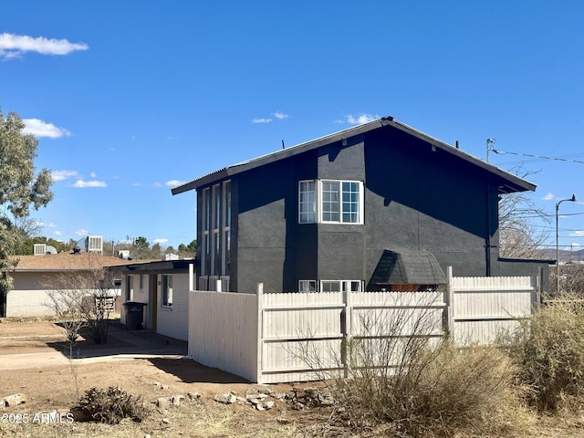 1705 E 6th St, Douglas, AZ 85607 - view of side of home with stucco siding
