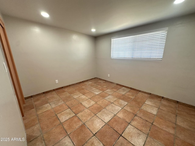 1705 E 6th St, Douglas, AZ 85607 - empty room with recessed lighting, light stone finish flooring, and baseboards