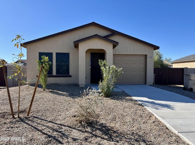 ranch-style home featuring a garage