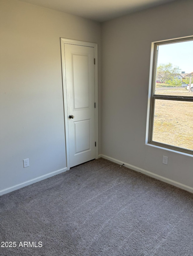 view of carpeted spare room