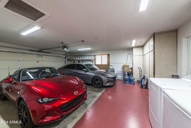 garage with independent washer and dryer