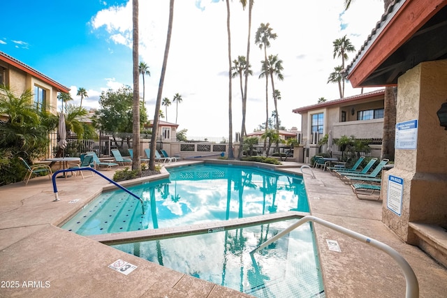 view of pool featuring a patio