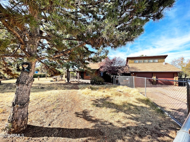 view of yard with a garage