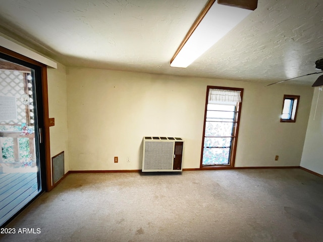 empty room featuring light colored carpet