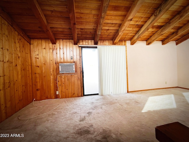 carpeted spare room with wooden ceiling, wood walls, and beamed ceiling