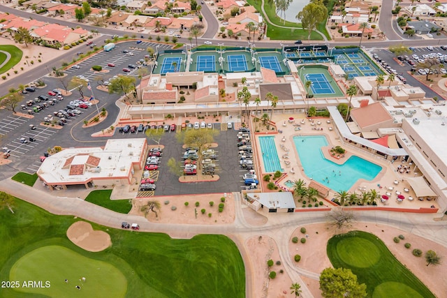 birds eye view of property with golf course view