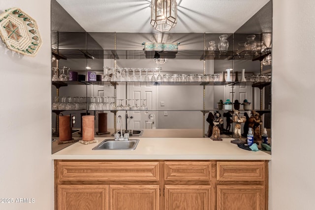 bar featuring a sink and indoor wet bar