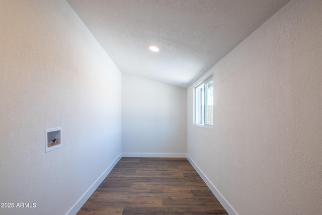 826 S Drew St, Mesa, AZ 85210 - empty room featuring dark wood-style flooring, vaulted ceiling, and a textured ceiling