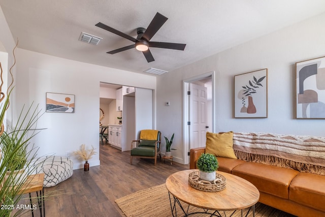 826 S Drew St, Mesa, AZ 85210 - living area featuring a ceiling fan and dark wood-type flooring