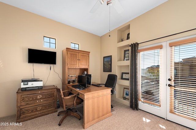 office featuring built in shelves and a ceiling fan