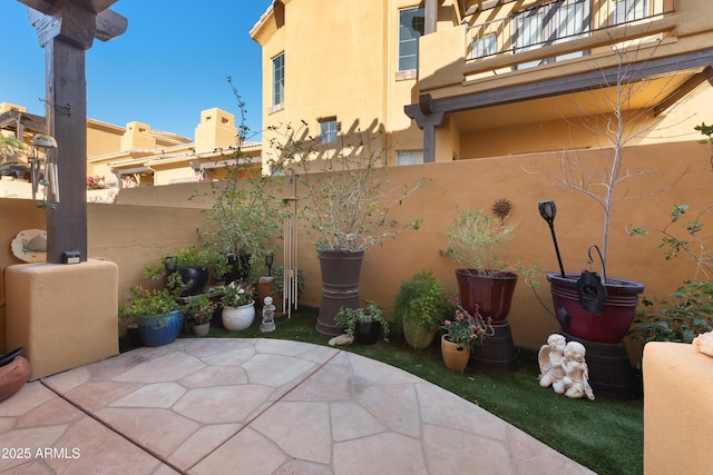 view of patio with fence