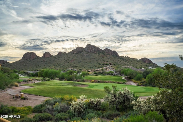 property view of mountains featuring view of golf course