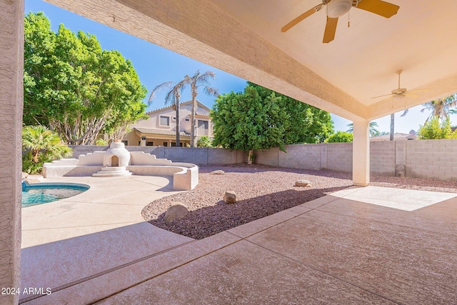 view of patio with ceiling fan