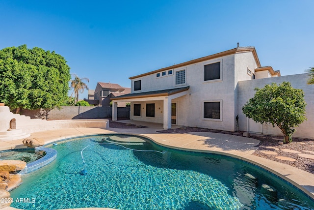 view of swimming pool featuring a patio