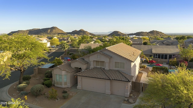 aerial view with a residential view and a mountain view
