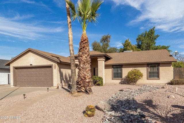 single story home with a garage