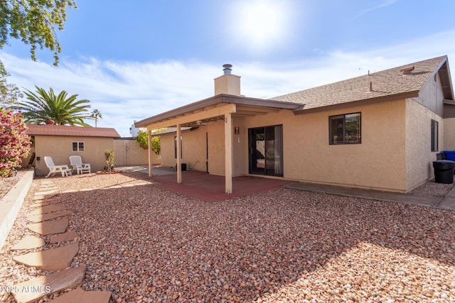 back of house featuring a patio