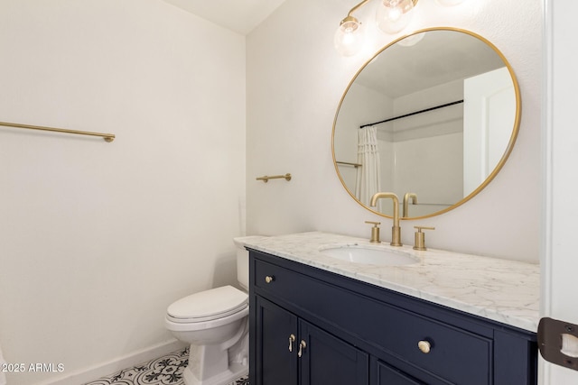 bathroom with vanity, a shower with curtain, and toilet