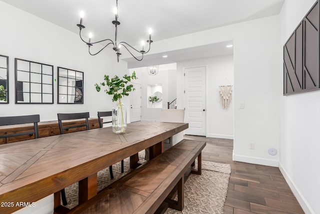 dining area with baseboards, a chandelier, dark wood finished floors, and recessed lighting